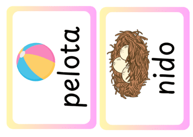 Tarjetas con las palabras "pelota" junto a una ilustración de una pelota de playa colorida, y "nido" junto a una ilustración de un nido con tres huevos.