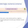 Diapositiva de PowerPoint titulada "Ludorregla de números enteros (positivos y negativos)" con dos viñetas sobre la suma y resta de números positivos y negativos, lo que ayuda a los estudiantes. Incluye un logo en la esquina superior derecha.