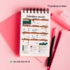 Agenda docente preescolar ciclo 2025-2026 abeja 11 Un calendario escolar encuadernado en espiral en español sobre fondo rosa con artículos de papelería, como bolígrafos y cuadernos. El calendario muestra los meses de agosto de 2023 a julio de 2024 y destaca los días festivos y las fechas importantes.