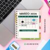 Agenda docente preescolar ciclo 2025-2026 catarina 13 Una agenda en espiral con el calendario de marzo de 2026 descansa sobre un ordenador portátil, rodeada de artículos de papelería, una calculadora azul y un fondo rosa. El día 16 aparece resaltado. Se ven los datos de contacto de WhatsApp e Instagram.