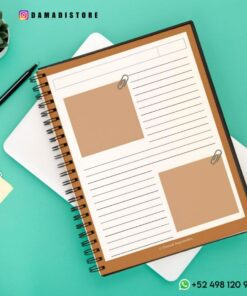 Imagen de un Cuaderno BT21 Shooky encuadernado en espiral con páginas en blanco con marcadores de posición para imágenes y texto. Un bolígrafo negro se encuentra en diagonal sobre el cuaderno, junto a una pequeña planta en una maceta y una pila de papeles. La información de contacto y el logotipo de BT21 Shooky son visibles en las esquinas superior e inferior.