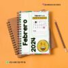 Un cuaderno encuadernado en espiral con una página abierta hasta febrero de 2024. La página presenta un calendario para el mes, una sección 