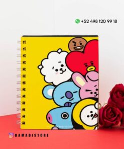 Un colorido cuaderno de espiral con personajes de dibujos animados en la portada, con varias caras de animales en tonos amarillo, rojo, azul y blanco. En el lado derecho se colocan tres rosas rojas y en la parte superior se muestra un número de contacto con un ícono de WhatsApp.