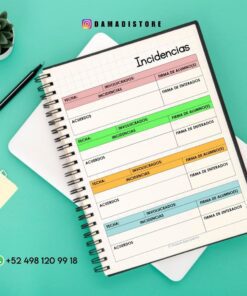 Un cuaderno de espiral con la etiqueta 
