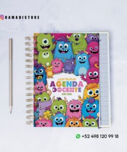 Una colorida agenda docente con simpáticos monstruos de dibujos animados en la portada, titulada "Agenda Docente 2015-2016". Junto a ella hay un bolígrafo y la información de contacto aparece sobre un fondo blanco.