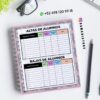 Un cuaderno de espiral abierto con páginas tituladas 