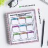 Un cuaderno de espiral con un cuadro titulado 