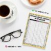 Agenda docente director 2025-2026 18 Vista superior de un escritorio con una taza de café, un donut, un par de gafas negras y un cuaderno de espiral con la etiqueta